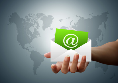 Envelope letter email hands of women on world
