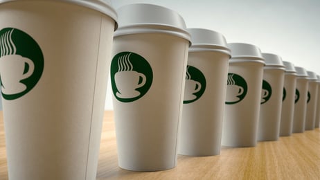 Paper Coffee Cups In a Row