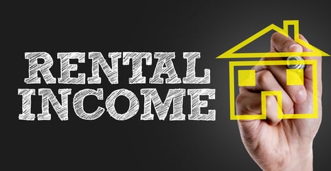Hand writing the text: Rental Income