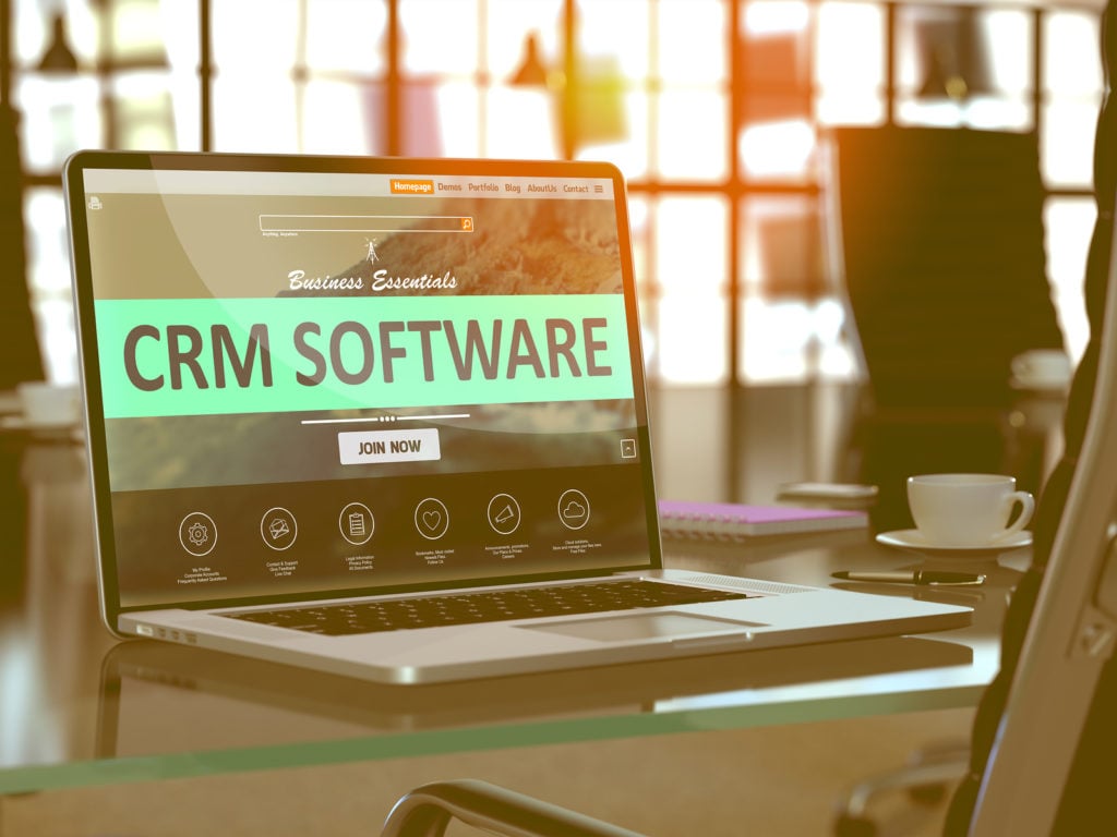 CRM Software Concept on Laptop Screen