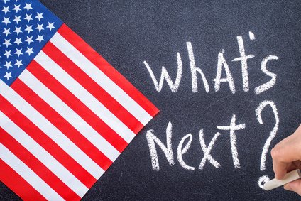 Whats next on the chalk board and US flag