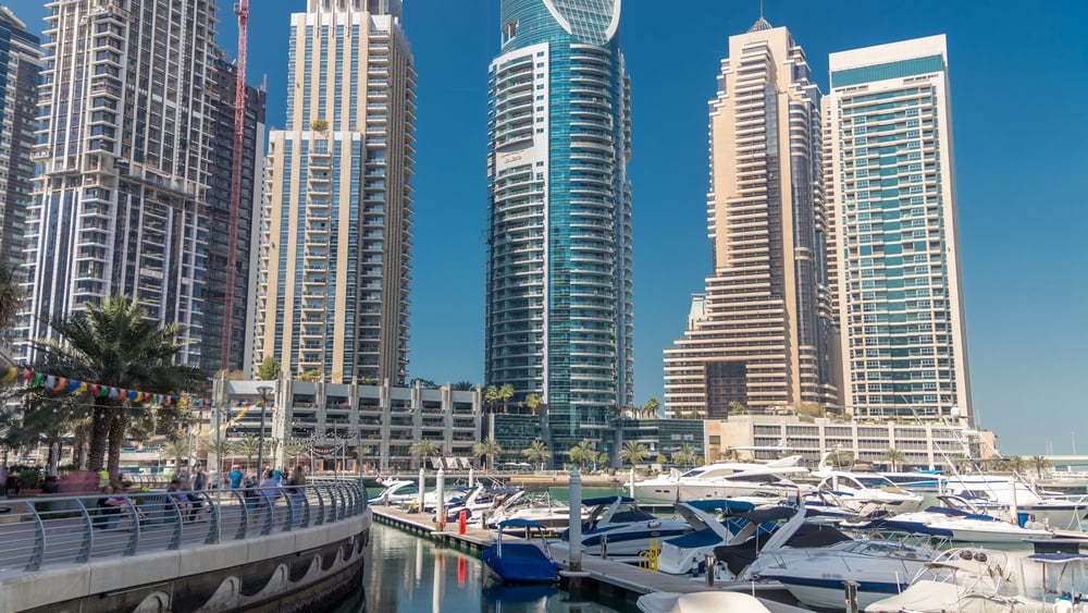 Dubai marina bay with yachts an boats timelapse