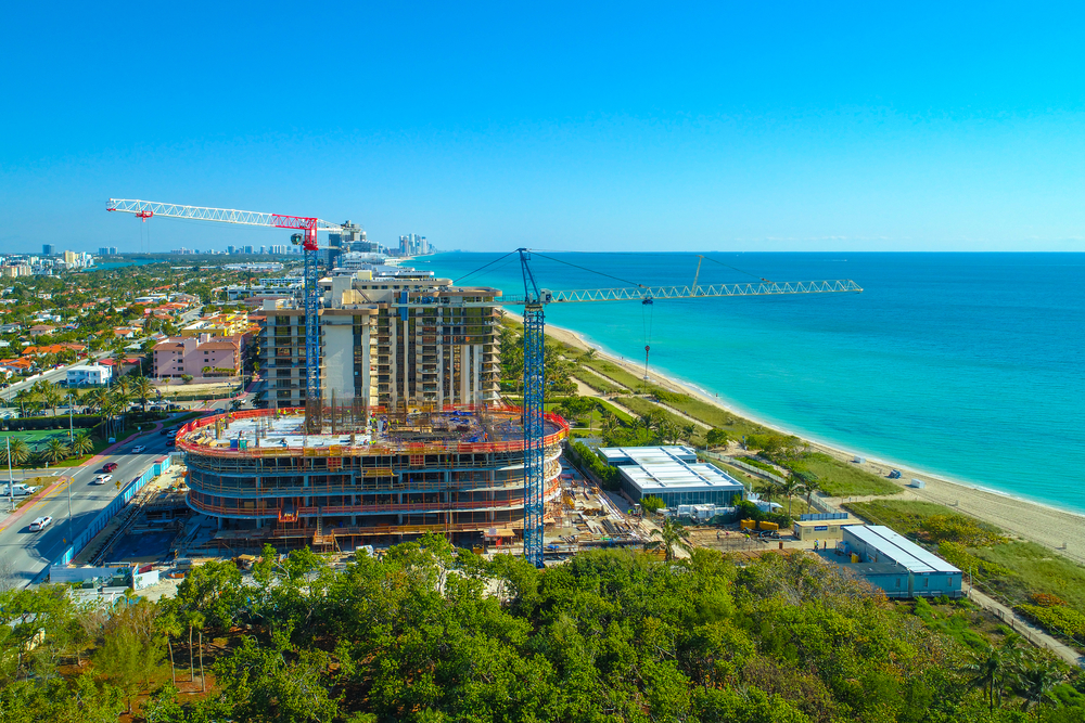 Aerial photo oceanfront real estate condo construction Miami Bea