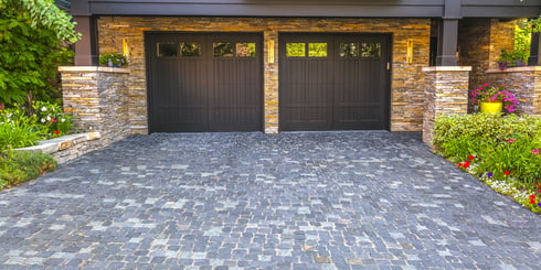 Brick stone driveway double garage doors pano