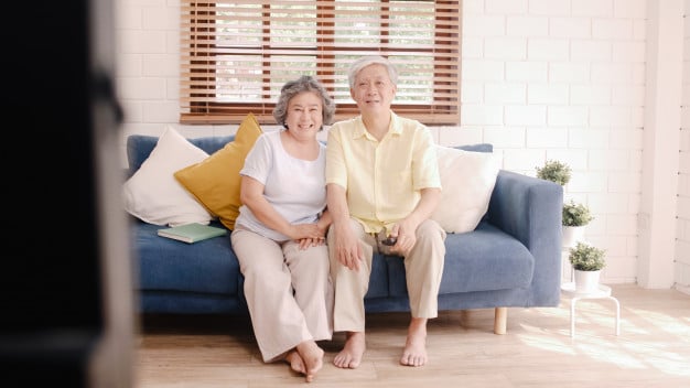 asian elderly couple watching television living room home sweet couple enjoy love moment while lying sofa when relaxed home 7861 1510