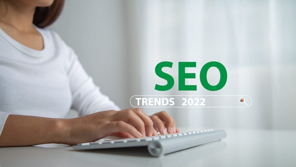 SEO Search Engine Optimization trends 2022 Ranking traffic website internet business technology concept Text SEO in green color with search bar screen over website