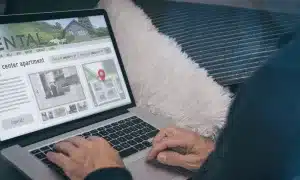 man reading real estate ad