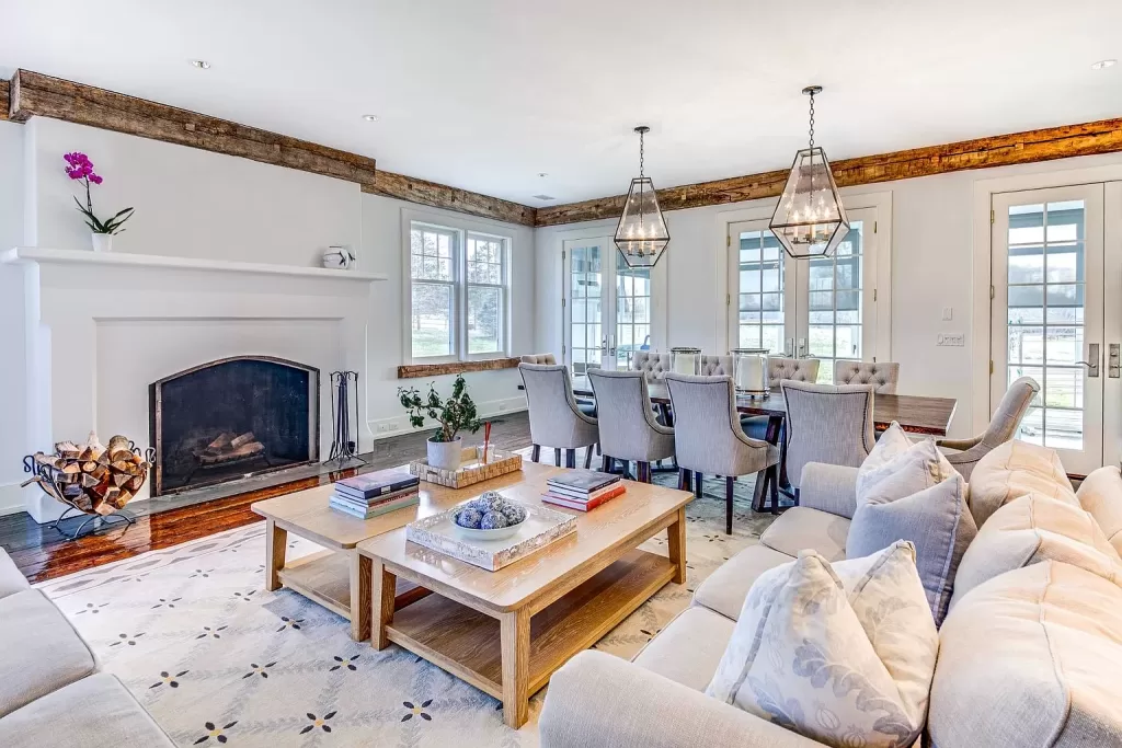 Alec Baldwin Amagansett Mansion dining room with fireplace