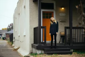 single woman on a porch